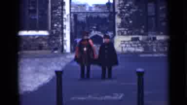 London England (1946): Two Men Walking In Heavy Coats To Protect Themselves From