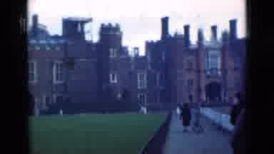 London England (1946): People On A Cloudy Day Wearing Coats Walking Toward A