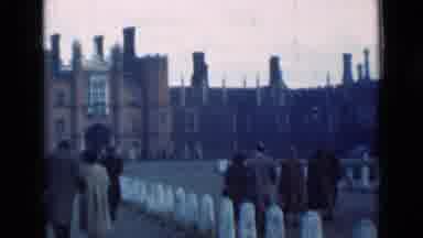 London England (1946): People Walking Towards A Huge Building