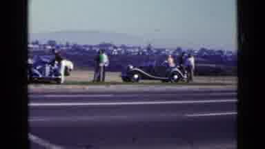 San Diego California USA (1949): Classic Cars By The Roadside With People