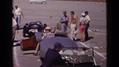 San Diego California USA (1949): People Around Sports Cars At A Race Car During