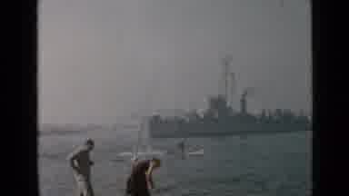 San Diego California USA (1949): A Couple Fishing In The Bay Of A Major City While