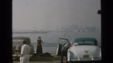 San Diego California USA (1949): People Taking Pictures Of City From Harbor Shore