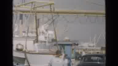San Diego California USA (1949): A Boat Suspends Above A Dock