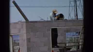 San Diego California USA (1949): Bricklayer Working Laying Cement Putty On A Wall