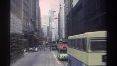 Hong Kong-1982: High Very Tall Buildings In The City With Buses Roam Streets