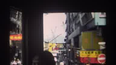 HONG KONG-1982: Double-Decker Buses Navigate Crowded City Streets And Pass