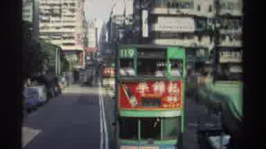 Hong Kong (1982): Trolley Train Riding Through The Crowded Streets Of China