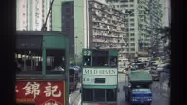 Hong Kong (1982): Train Rider Recording A Passing Train Car As It Zips By