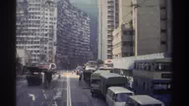 Hong Kong (1982): Very Clutter City Large Building Train Passing Transportation