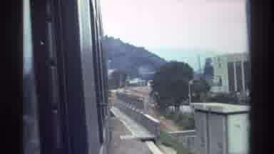 Hong Kong (1982): Transportation Train Going Around The City With People On The