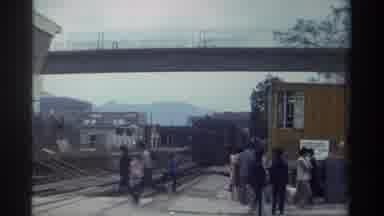 Taiwan (1982): People Crossing The Railway Track While The Train Is Coming On The