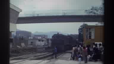 Taiwan (1982): Train Arriving In A Station Under A Bridge With One Man Making A