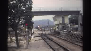 Taiwan (1982): Pedestrians Walk Towards Boarding Platform As Train Approaches