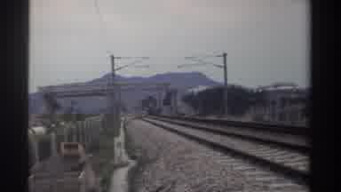 TAIWAN-1982: Train Moving Toward The Camera On Grainy 8mm Footage
