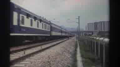 Taiwan (1982): Image Of Person Walking Along Railroad Tracks As Train Passes On