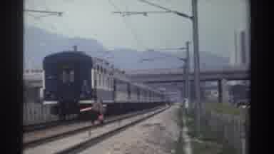 Taiwan (1982): Footage Of A Person Walking Carrying A Stick In Bag As A Train