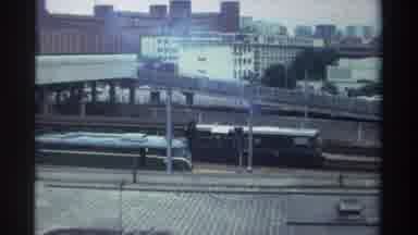 Taiwan (1982): Train Traveling Alongside Of Busy Highway On A Cloudy Day