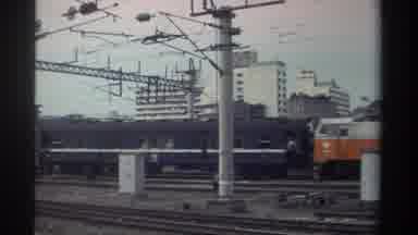 Taiwan (1982): Train With Carriages Along With Power Lines In Foreground And