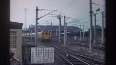 Taiwan (1982): Long Yellow Training Moving Quickly Down A Track Outside