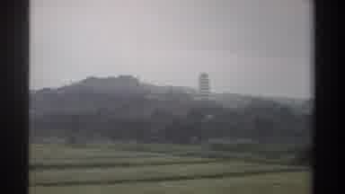Taiwan (1982): Panning Footage Of Asian Temple As Seen From Passing Car