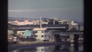 Taiwan (1982): Train Crossing A Bridge And A Boat Crossing A River In A City