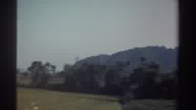 Taiwan (1982): Passing Mountains And Farmland On A Clear Day
