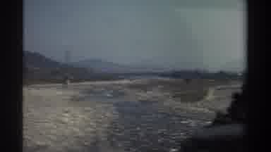 Taiwan (1982): Rocky Drive Along The Road With Power Lines And Taking A Video With