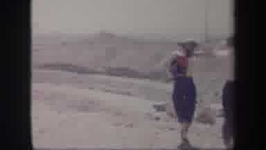 Arizona USA-1957: People Gather At Dusty Field On A Bright Sunny Day