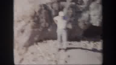 Arizona USA (1957): Men People Exploring Rock Formation In Dry Heat Environment