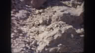 Arizona USA (1957): Several Excited Men Climbing Down A Steep Rocky Hilly Area Of