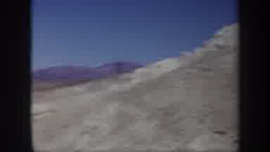 Arizona USA (1957): Person Maybe A Geologist Examining Rocks In A Desert With