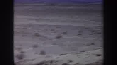Arizona USA (1957): Vast Empty Space Of Land With Mountains In The Background