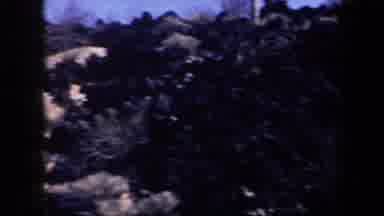 Arizona USA (1957): Man And Woman Walk On Rocky Trail On A Bright Sunny Day