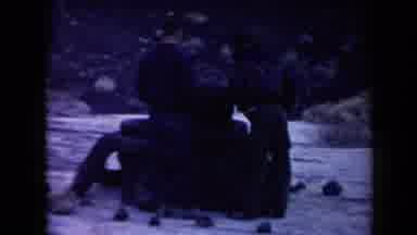 Arizona USA (1958): Three Men Appear To Be Setting Up A Small Tower Of Used Tires
