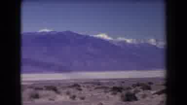 Arizona USA (1958): Mountains Dessert Vintage Film Clouds Snow Brown Left Panning