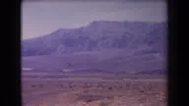 Arizona USA (1958): Footage Of A Mountainous Area By The Desert With A Road In The