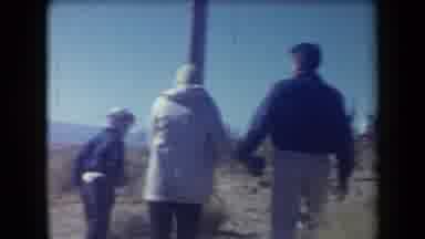 Arizona USA (1958): Large Group Of People Going Up The Hill Quietly