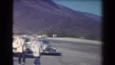 Arizona USA (1958): People Walking Driving And Standing In Cars Near A Shop With