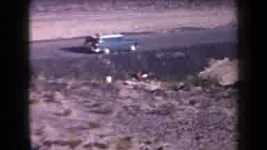 Arizona USA (1958): Sandy Terrain And Shot Of Cars And People Walking On A Clear