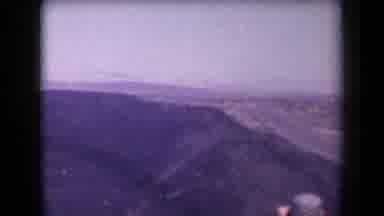 Arizona USA (1958): Explosion With Smoke Smoldering And Bursting Out Over A Desert
