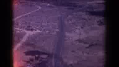 Arizona USA (1958): Arial A Road With Mountains And Sunshine In The Background