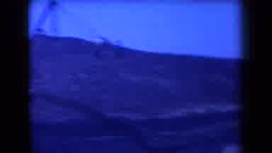 Arizona USA (1958): Man Walking Down A Hill Of Coal Putting Glasses On