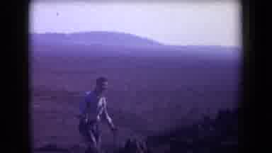 Arizona USA (1958): Two Men Standing In The Desert Under The Sun With Their Cars
