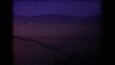 Arizona USA (1958): Driving In The Desert And There Is A Building In The Near