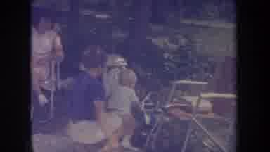 Michigan USA (1968): Toddler Is Exploring The World With His Mother By His Side