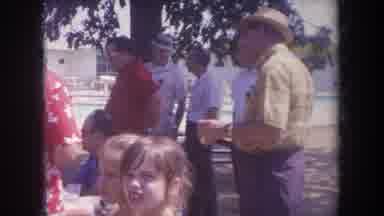 Michigan USA (1968): Men Women And Kids Talking To Each Others While Standing Next