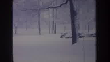Michigan USA (1968): Children Build And Play In Homemade Igloo On Winter Day