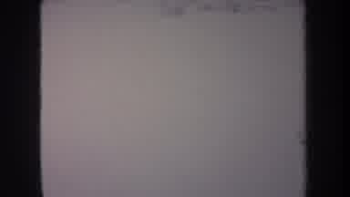 Michigan USA (1968): Dog Barking At The Fence In The Backyard Of A Snow Covered