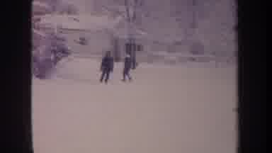 Michigan USA (1968): Kids Play Outside In The White Snow After A Snowstorm